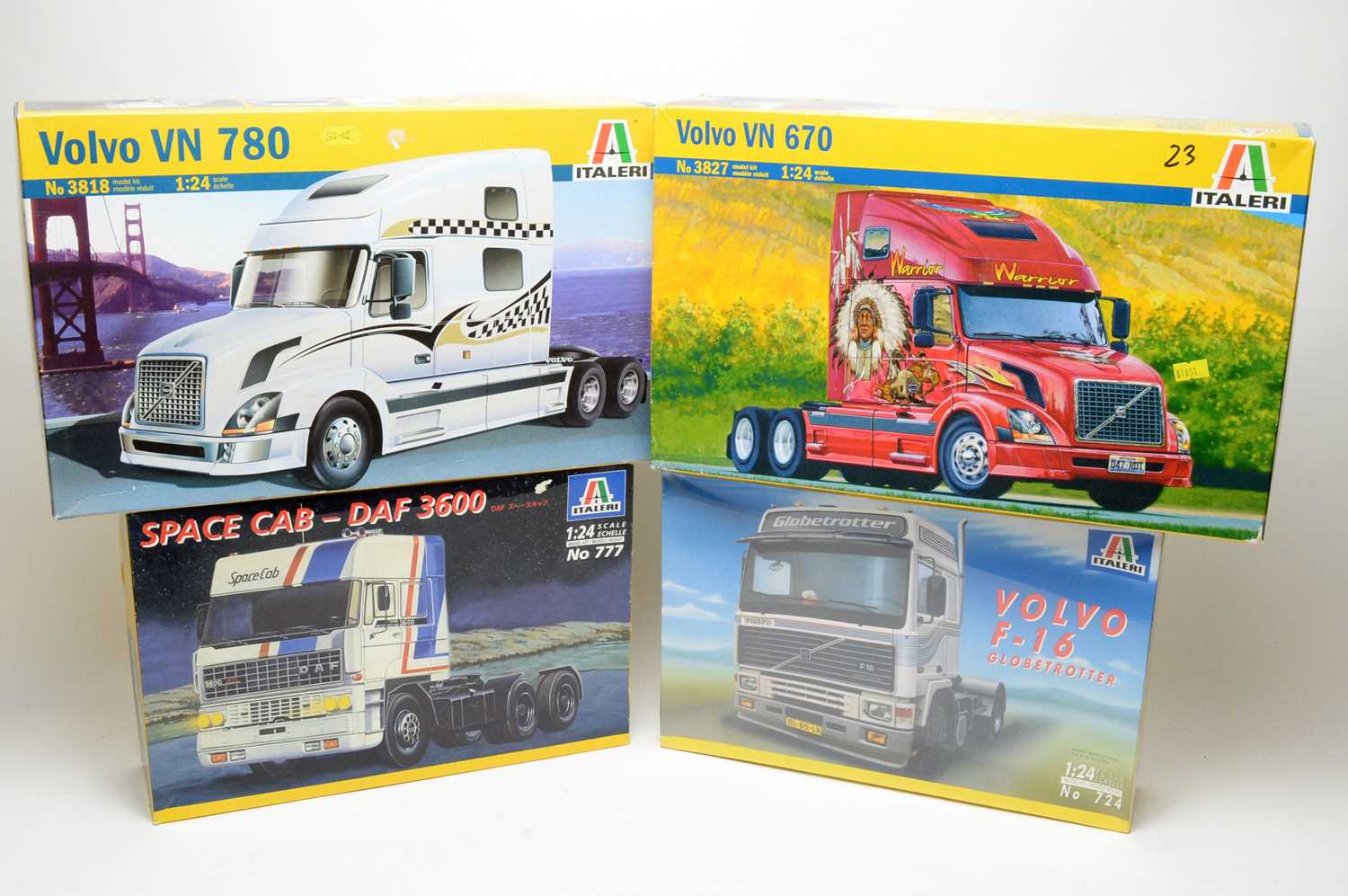 Four boxed Italeri scale model trucks.