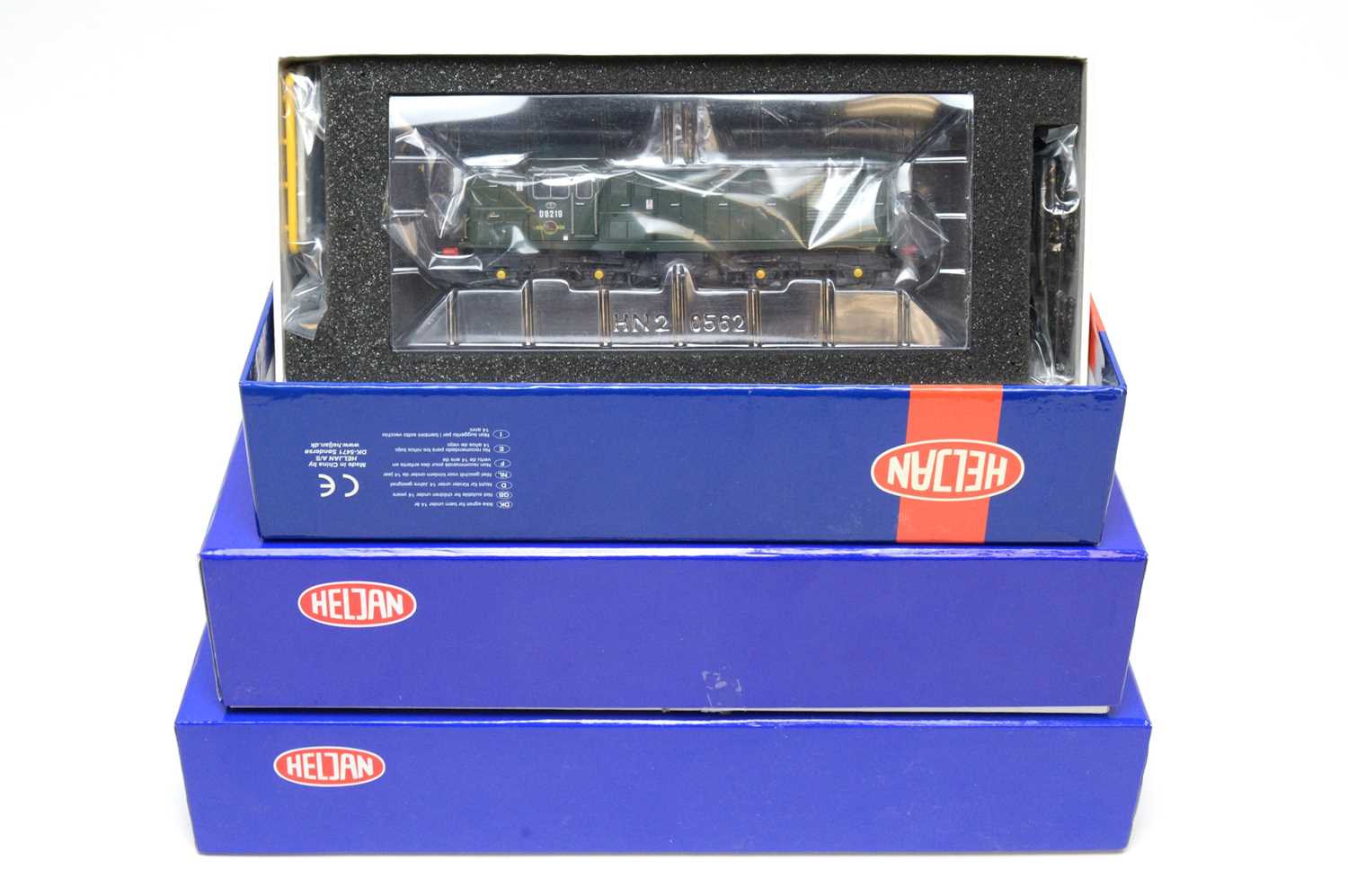 Three Heljan 00-gauge boxed trains.