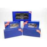 Five Heljan 00-gauge boxed trains and rolling stock.