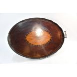 An oval Victorian satinwood inlaid mahogany serving tray