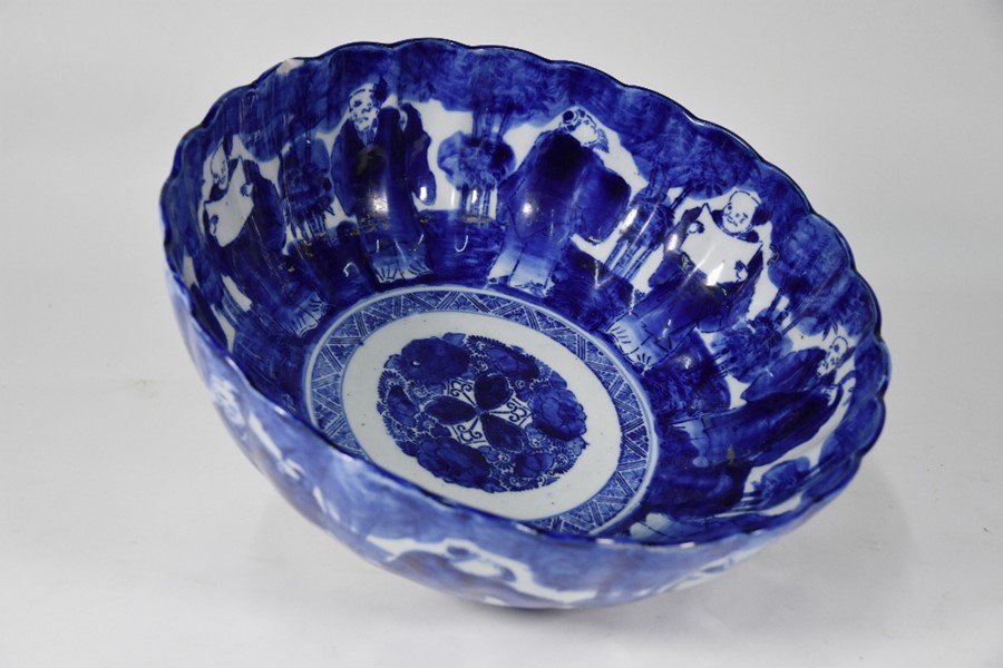 A 19th century Japanese blue and white floriform punch bowl