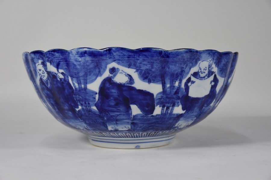 A 19th century Japanese blue and white floriform punch bowl - Image 2 of 4