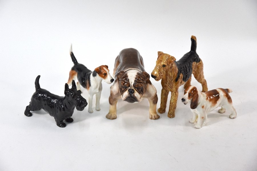 Five Royal Doulton dogs