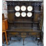 A 17th century style oak high dresser circa 1920's