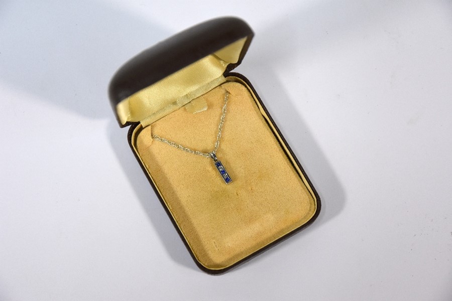 Diamond and sapphire pendant