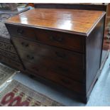 A George III mahogany chest of two short over three long graduated drawers