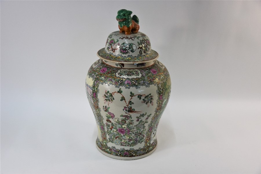 A large 20th century Chinese famille rose baluster jar with domed cover