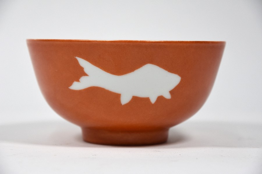 A Chinese reserve decorated orange glazed bowl decorated with fish - Image 3 of 4