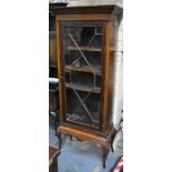 A mahogany astragal glazed cabinet on stand