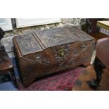 Large profusely relief carved oriental camphorwood trunk
