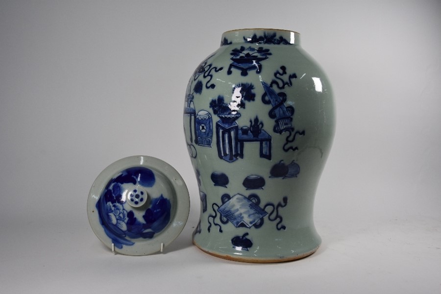 A Chinese blue and white celadon ground 'Hundred Antiques' pattern jar and cover - Image 2 of 6