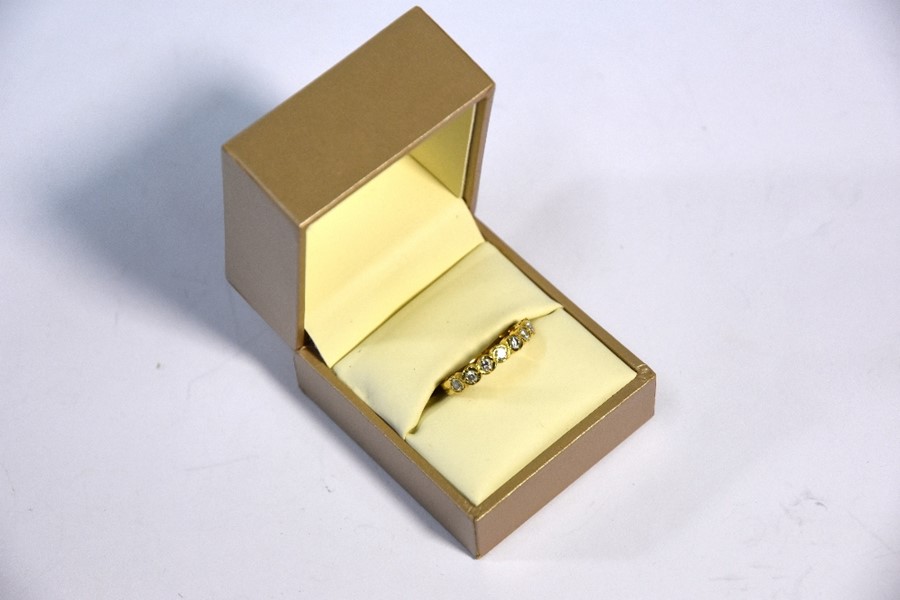 An 18ct yellow gold diamond set half eternity ring - Image 2 of 5