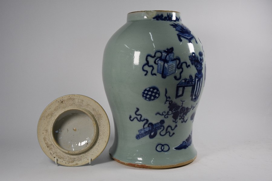 A Chinese blue and white celadon ground 'Hundred Antiques' pattern jar and cover - Image 4 of 6