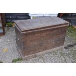 A large antique stained pine storage trunk