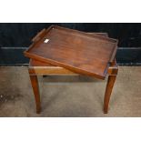 A rectangular mahogany tray top table