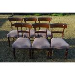 A set of six Regency mahogany bar back dining chairs
