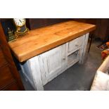 A bespoke jointed pine kitchen cabinet/butcher's block