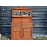 An Edwardian carved mahogany chiffonier