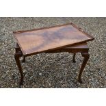 A '1961 Patricia Swedish Line' mahogany tray-top table