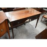 A late Victorian mahogany writing table