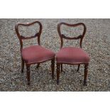 A set of four Victorian mahogany dining chairs