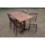 A refectory style dining table and four chairs