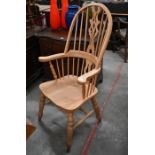 A modern beech Windsor style open armchair