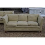 A country house three-seater sofa