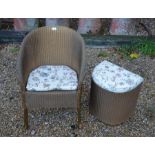 A Lloyd Loom 'Lusty' wicker chair to/w matching laundry basket (2)
