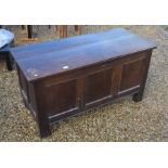 An 18th/19th century panelled oak coffer