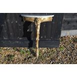 An 18th/19th century shell, scroll and acanthus carved gilt console table