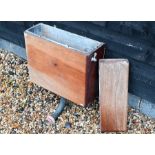 An old mahogany lead lined cistern