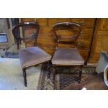 A set of four Victorian rosewood dining chairs