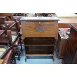 An Arts & Crafts period oak fall front bureau