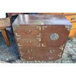 A Japanese stained hardwood and brass mounted cabinet