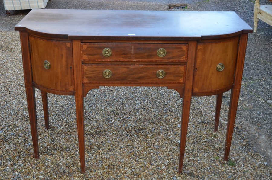 An Edwardian mahogany inlaid sideboard