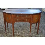 An Edwardian mahogany inlaid sideboard