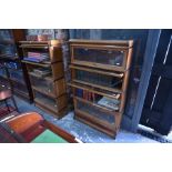 Globe Wernicke, a companion pair of oak four section glazed library bookcases