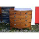 A 19th century mahogany inlaid bowfront chest of two short over three long drawers