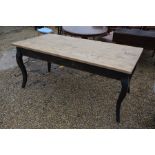 A French style pine topped dining table