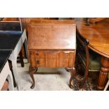 A Queen Anne style walnut fall-front bureau