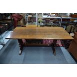 An oak refectory dining table and five chairs