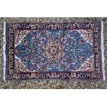 A Persian Kerman rug