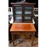 A Victorian mahogany hall table and a small bookcase