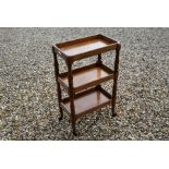 A Victorian mahogany three-tier dumb waiter/trolley