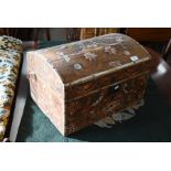 An antique dome top trunk