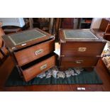 A pair of mahogany and brass mounted campaign style bedside chests