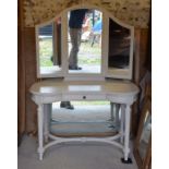 A Continental cream painted dressing table