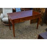 A modern stained hardwood dressing table with three drawers