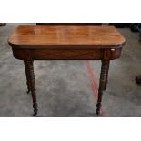 A 19th century inlaid mahogany folding tea table